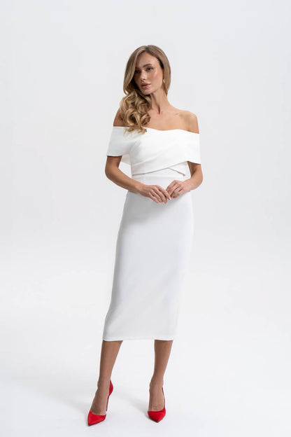 Woman wearing a white off-shoulder dress with a plain background