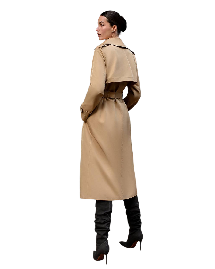 Woman wearing a beige trench coat on a white background
