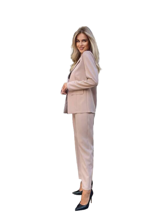 Woman wearing a beige suit on a white background