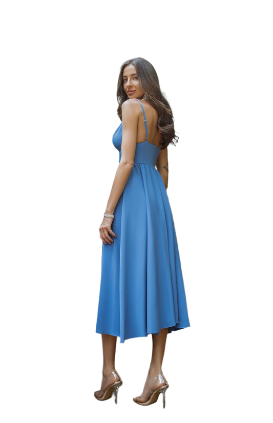 Woman wearing a blue dress on a white background