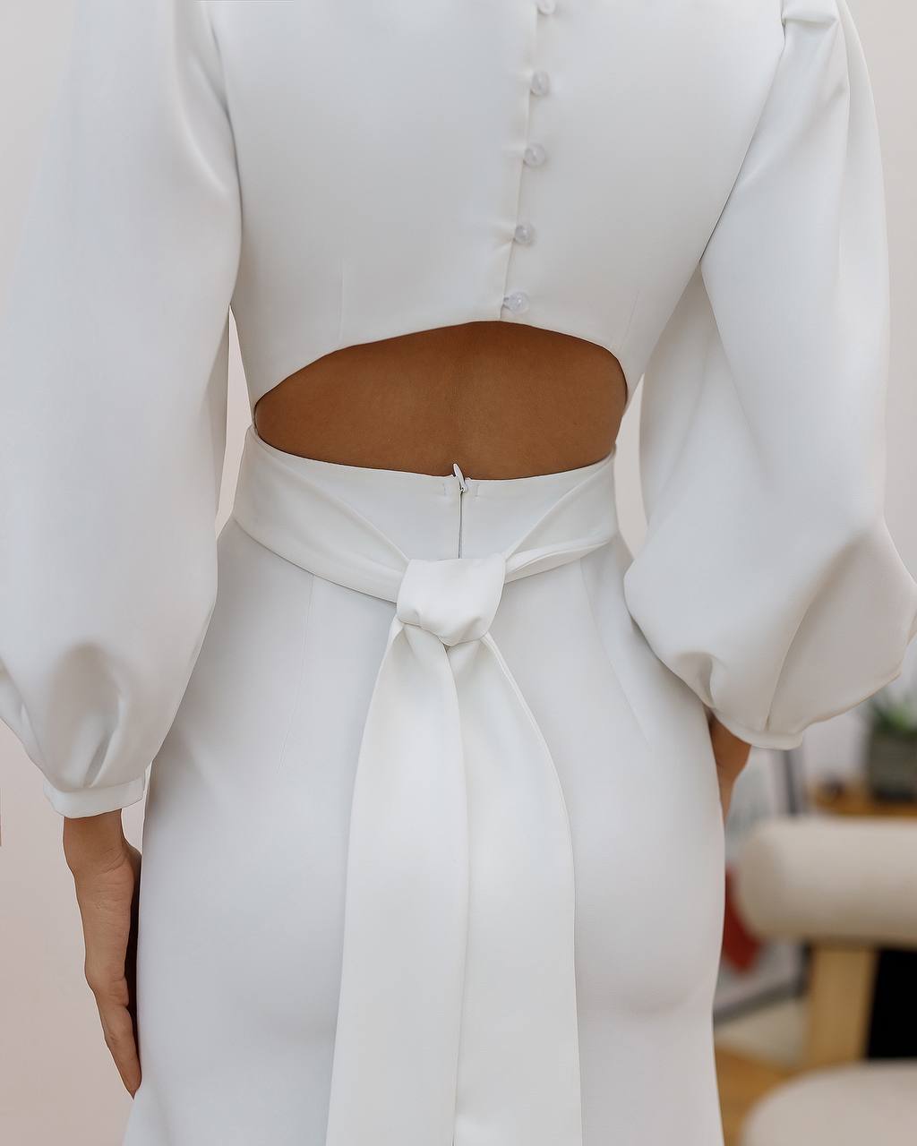White dress with cut-out back design