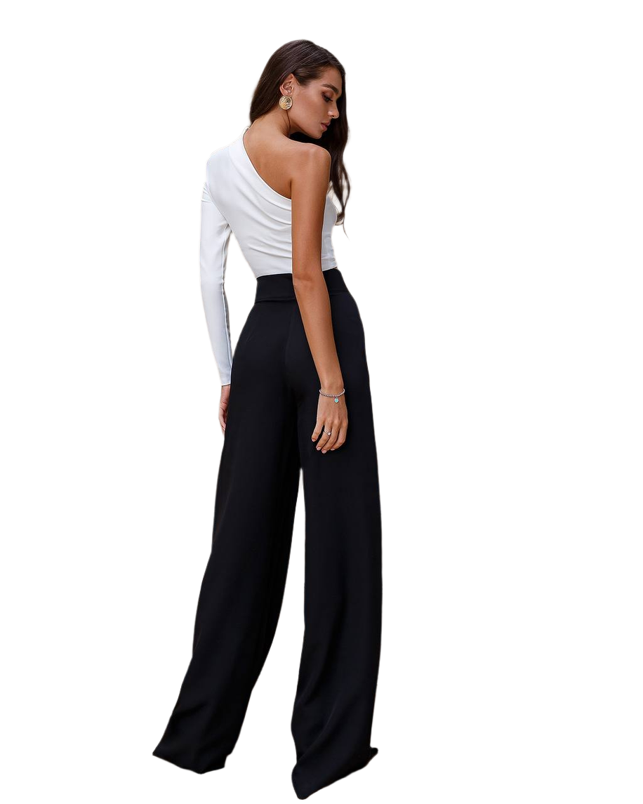 Woman wearing a white one-shoulder top and black wide-leg pants on a white background