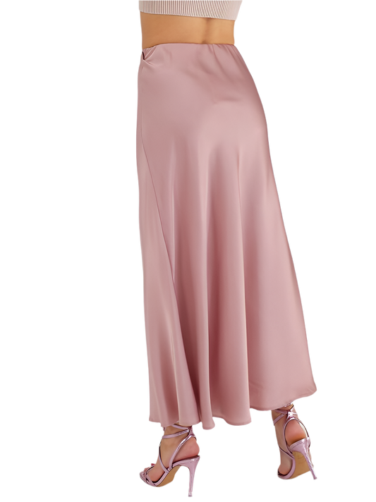 Pink skirt worn by a person on a white background