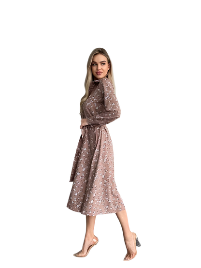 Woman wearing a floral dress on a white background