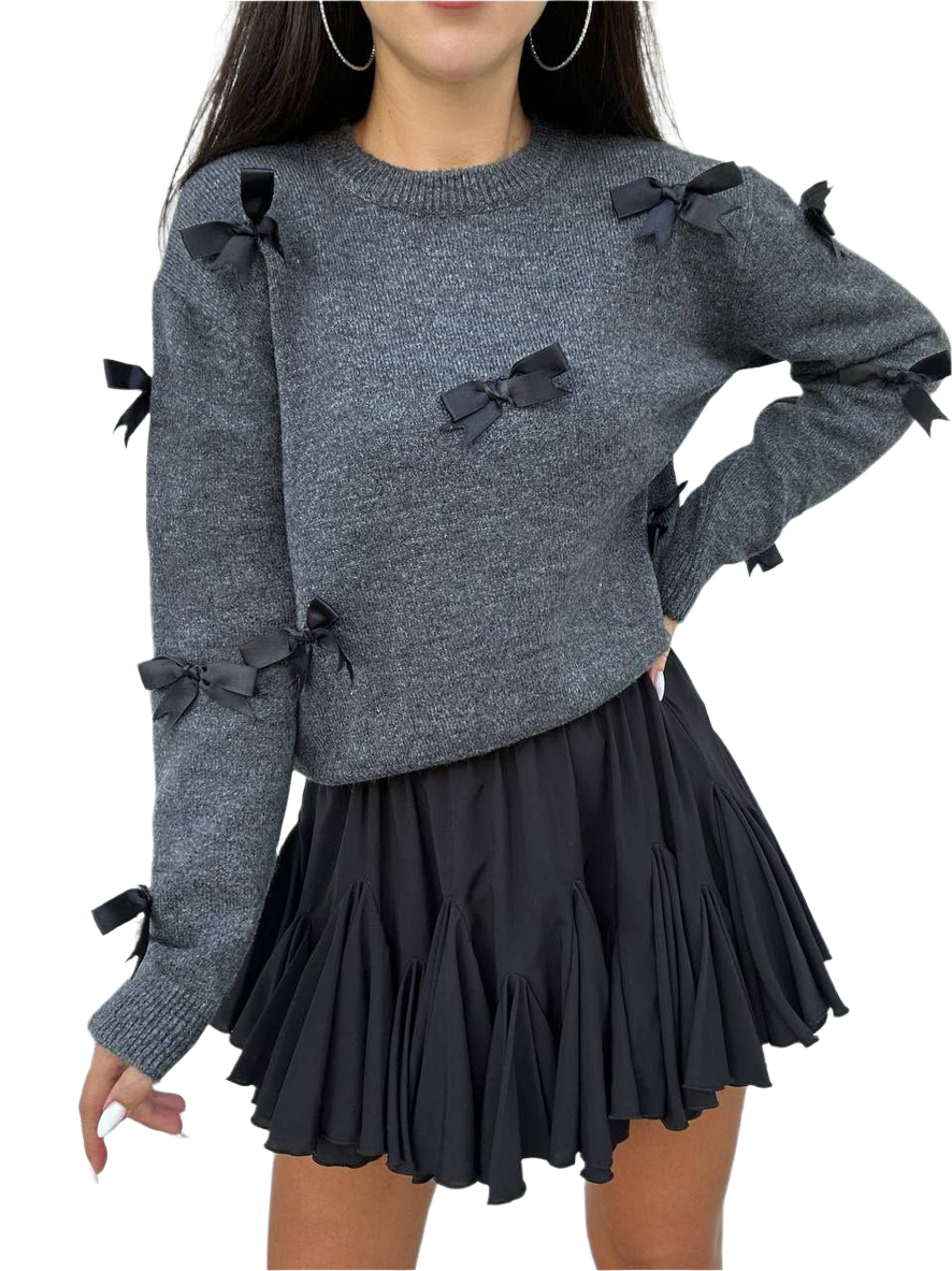 Gray sweater with black bows and a black skirt on a white background