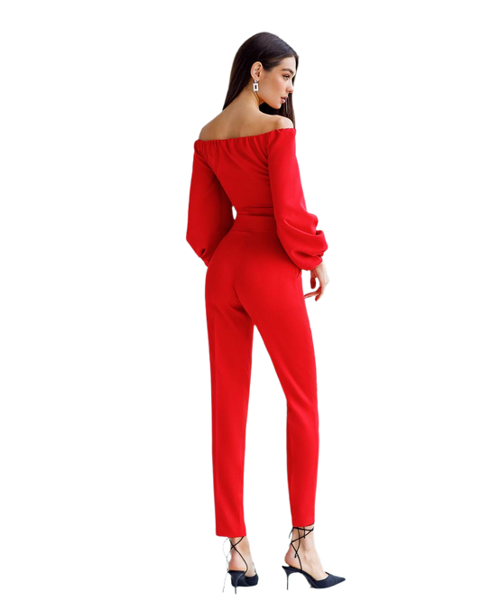Red off-shoulder jumpsuit worn by a model on a white background