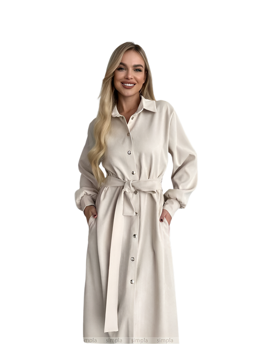 Woman wearing a beige dress with a belt on a white background