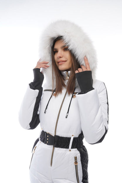 Woman wearing a white winter coat with fur hood on a white background