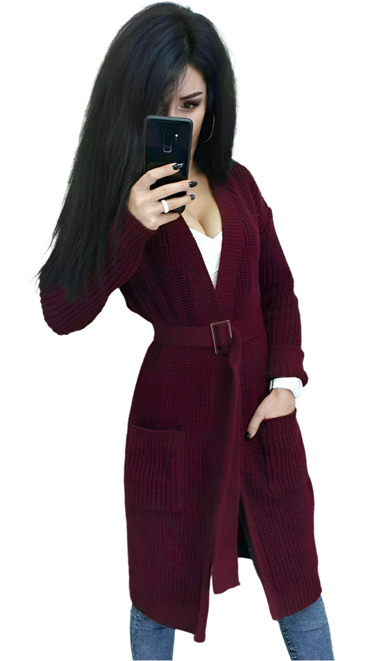 Person wearing a burgundy cardigan on a white background