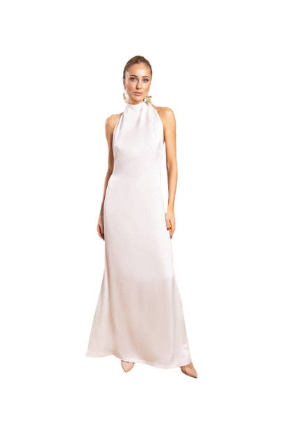 Woman wearing a white halter neck gown on a white background