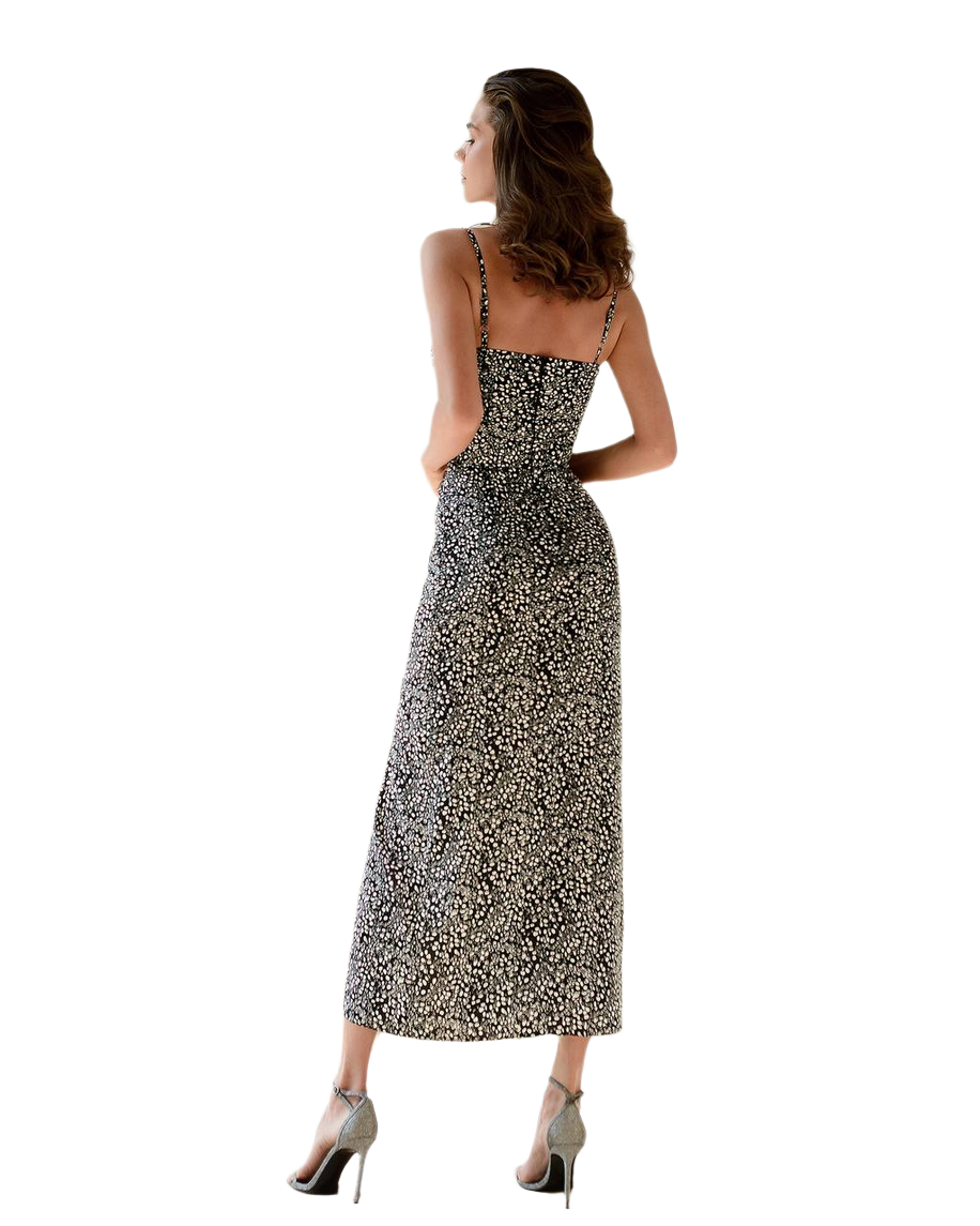 Woman wearing a floral dress on a white background