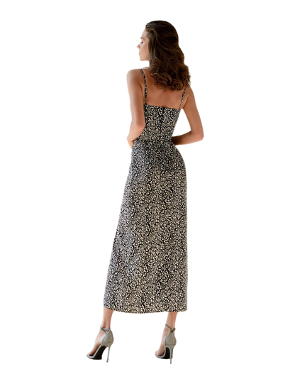 Woman wearing a floral dress on a white background