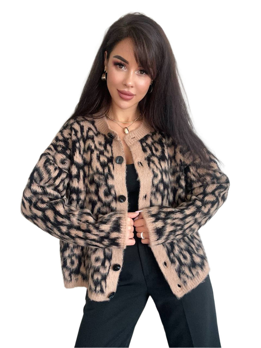Woman wearing a leopard print cardigan on a white background