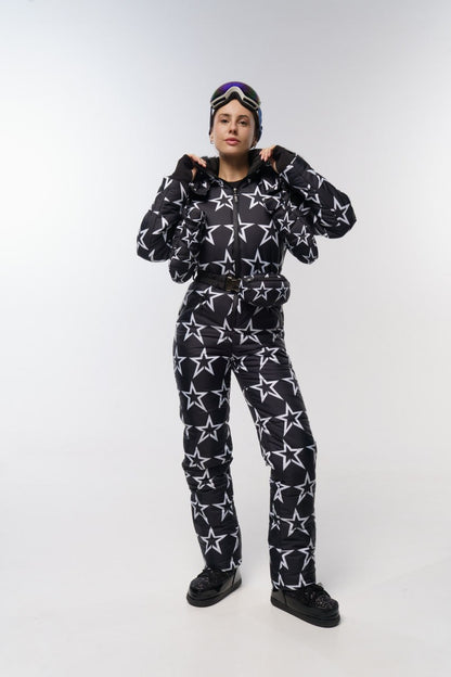 Person wearing a black star-patterned outfit on a white background