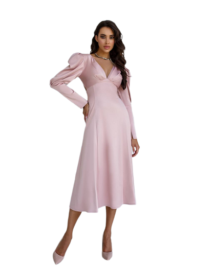 Woman wearing a pink dress on a white background