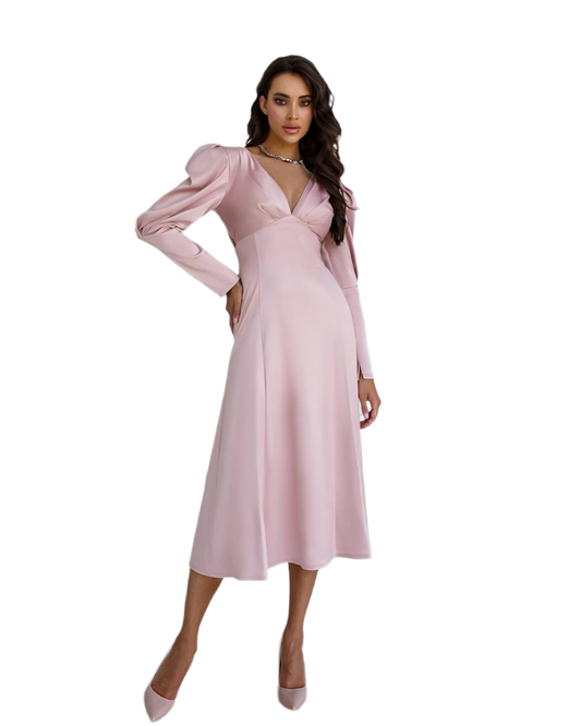 Woman wearing a pink dress on a white background