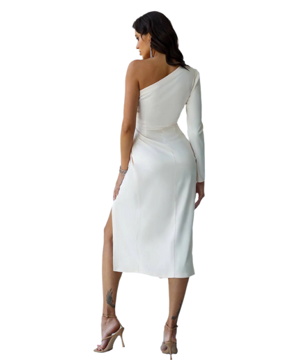 Woman wearing a white one-shoulder dress with a slit on a white background