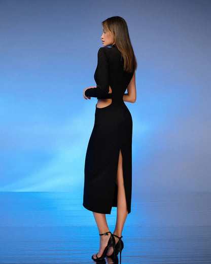 Woman wearing a black dress with cut-out design on a blue gradient background