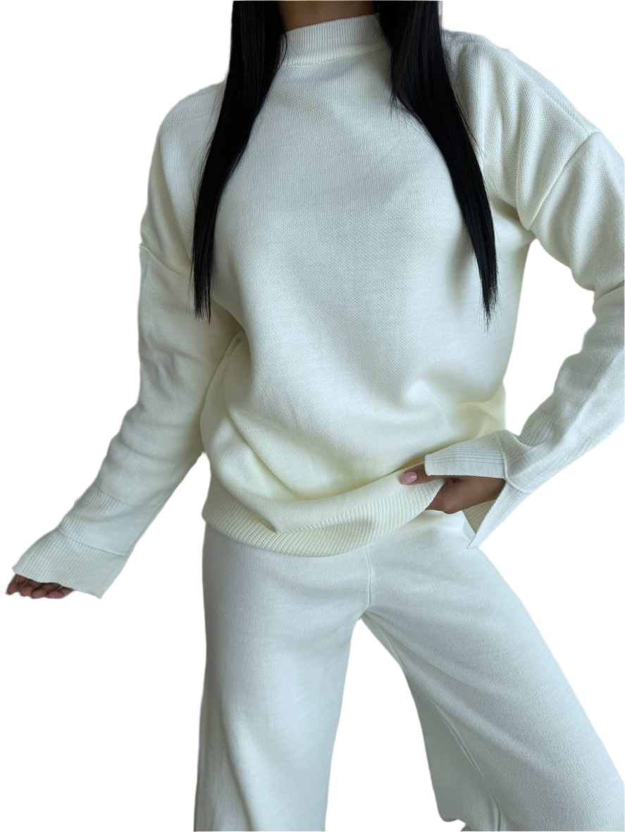 White sweater and pants set on a white background
