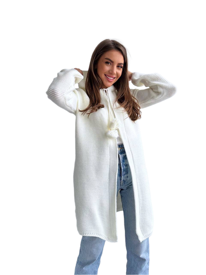 Woman wearing a long white sweater with a hood on a white background