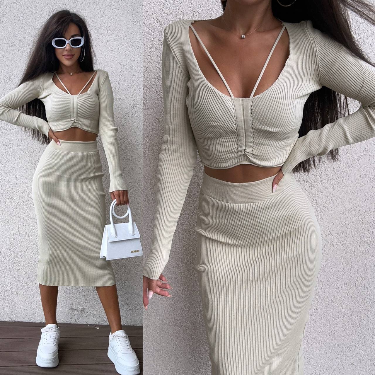 Woman wearing a beige long-sleeve top and skirt set with white sneakers and sunglasses.