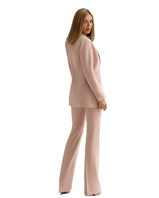 Woman wearing a beige suit on a white background