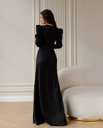 Elegant Black Maxi Dress with Long Sleeves and Front Slit
