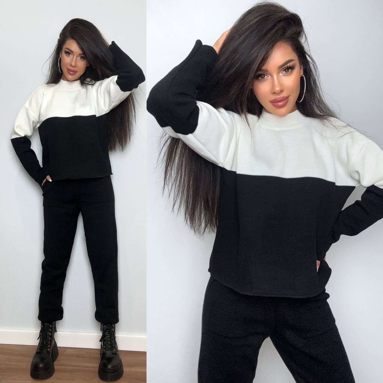 Woman wearing a black and white color-blocked outfit with a plain background