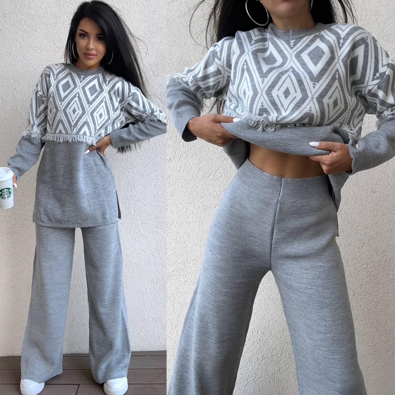 Woman wearing a gray and white patterned outfit holding a hat.