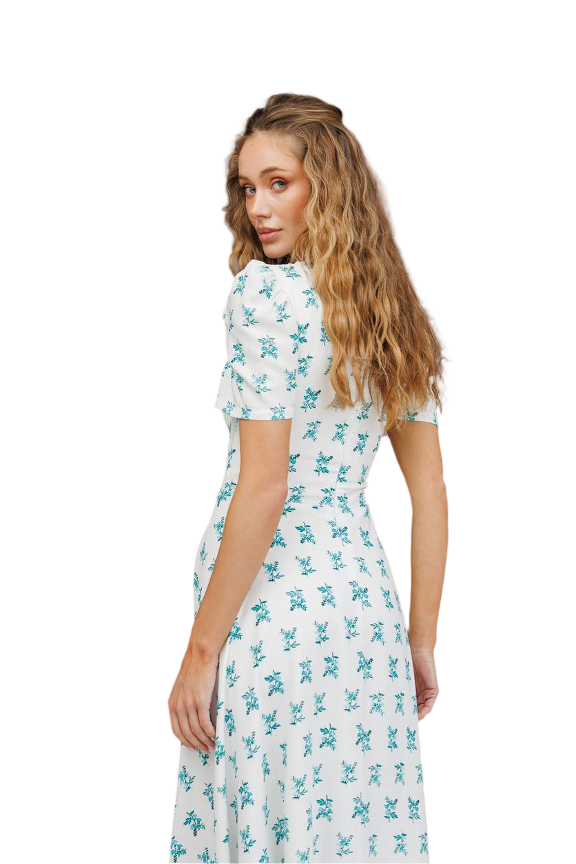 Woman wearing a floral dress on a white background