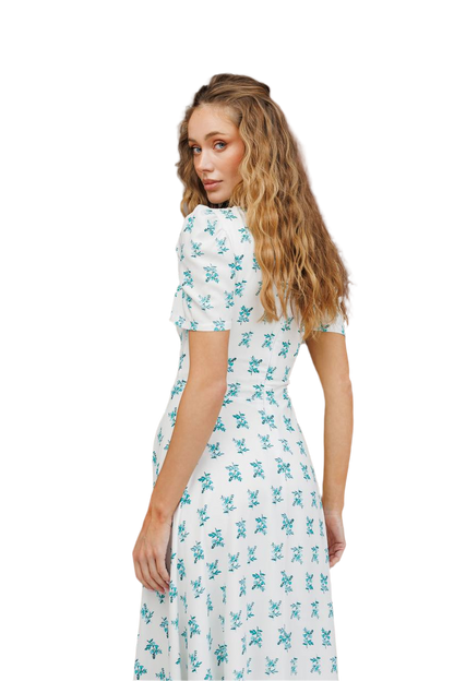 Woman wearing a floral dress on a white background