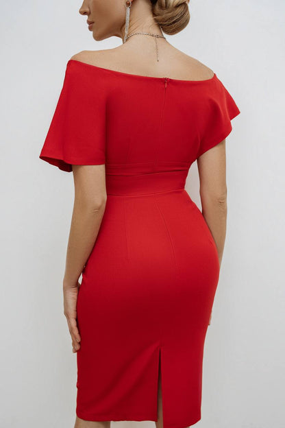Red off-shoulder dress worn by a person on a white background
