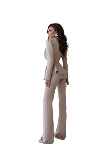 Woman wearing a beige suit on a white background