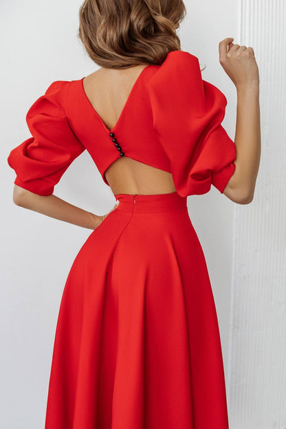 Red dress with puff sleeves on a white background