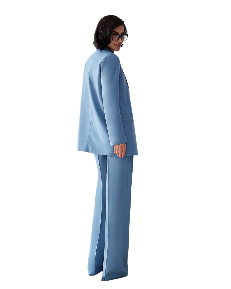 Woman wearing a light blue suit on a white background