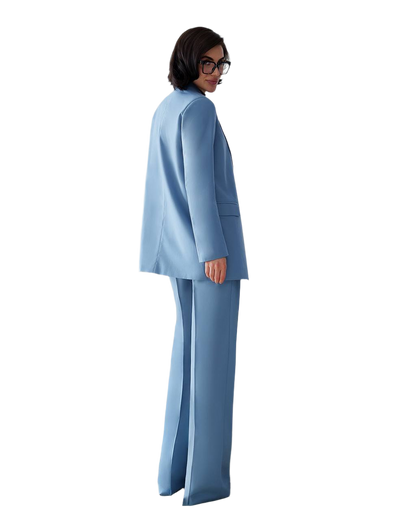 Woman wearing a light blue suit on a white background