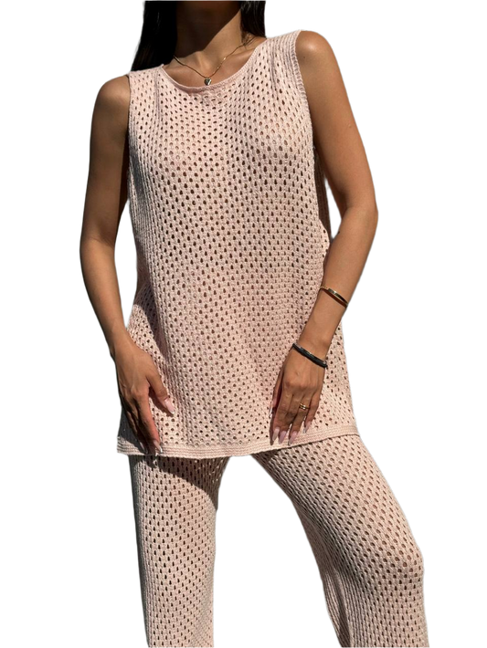 Woman wearing a beige mesh outfit on a white background