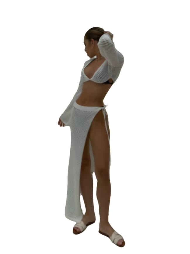 Woman wearing a white outfit with a high slit on a white background