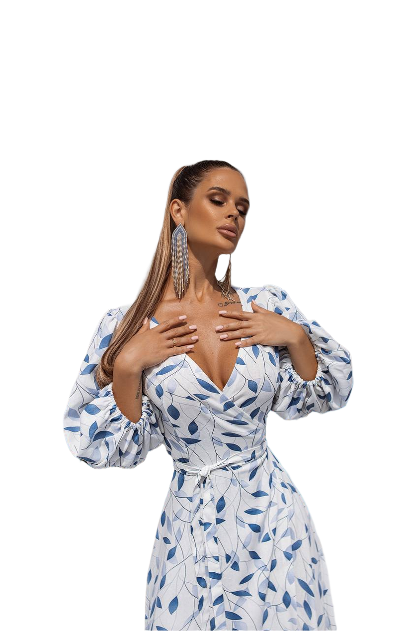 Woman wearing a blue and white patterned dress on a white background