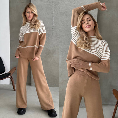 Woman wearing a brown and white striped sweater with matching pants in an indoor setting.