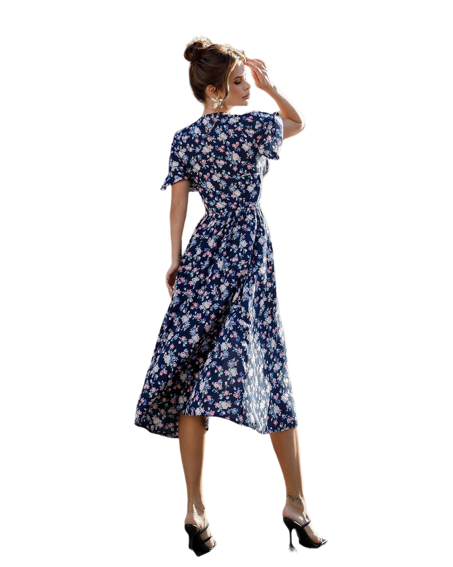 Woman wearing a blue floral dress on a white background