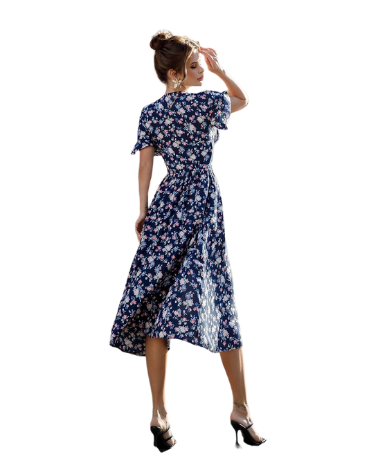 Woman wearing a blue floral dress on a white background