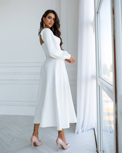 White Midi Dress with Cups and Long Puff Sleeves for Women