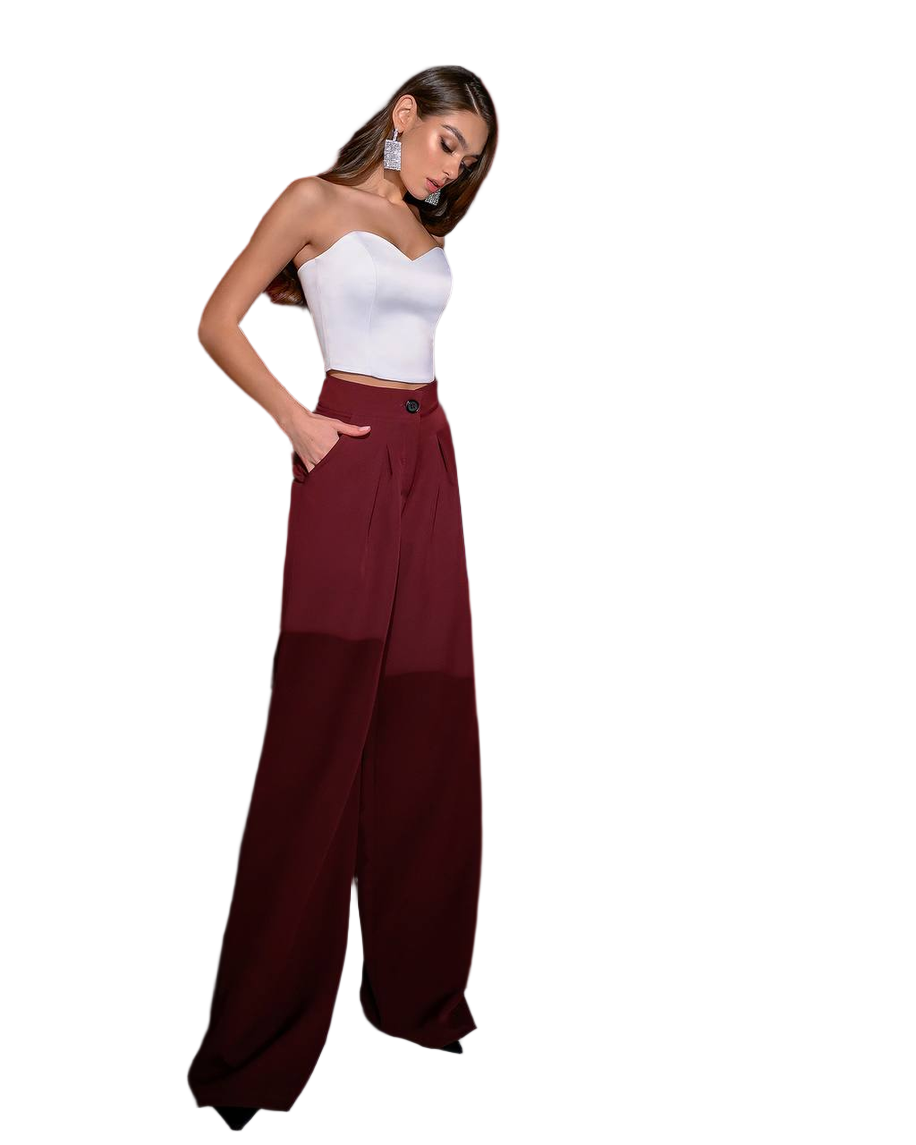 Woman wearing a white top and burgundy wide-leg pants on a white background