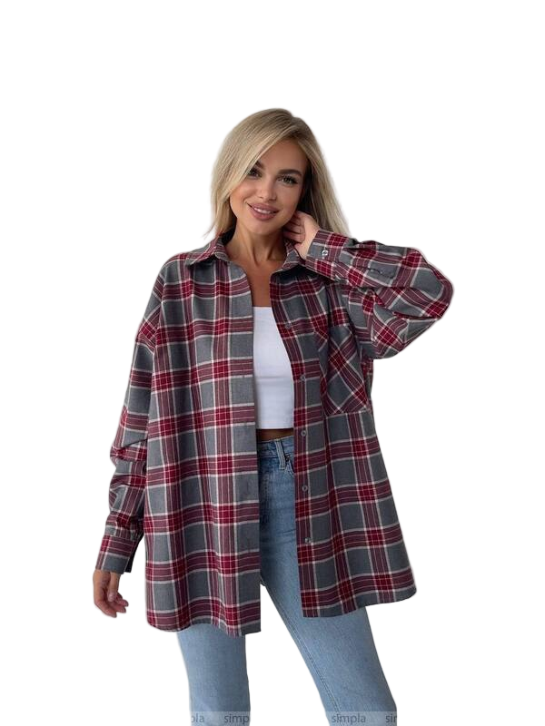 Woman wearing a plaid shirt over a white top and jeans on a white background
