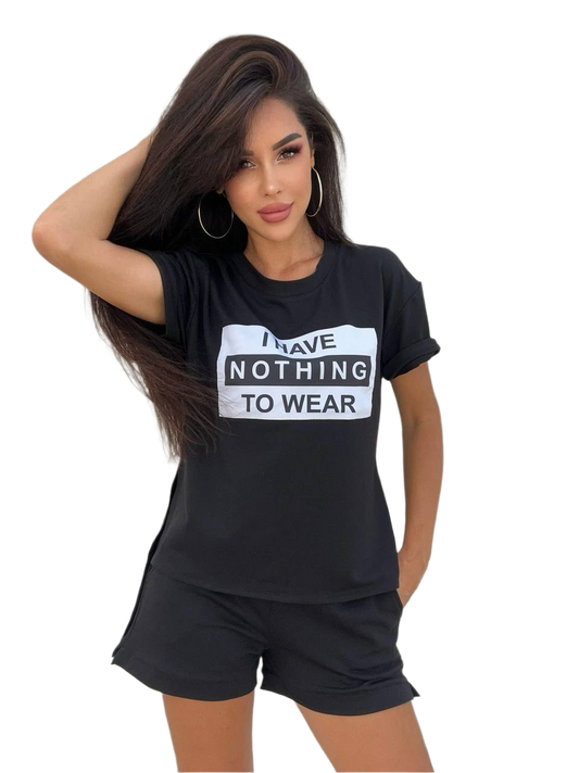 Woman wearing a black t-shirt with 'I Have Nothing to Wear' text on a white background