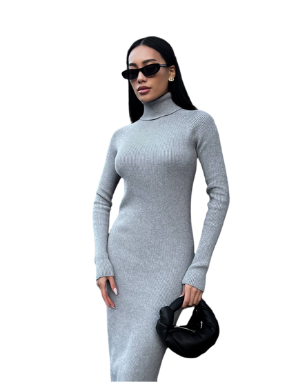 Woman wearing a gray long-sleeve dress on a white background
