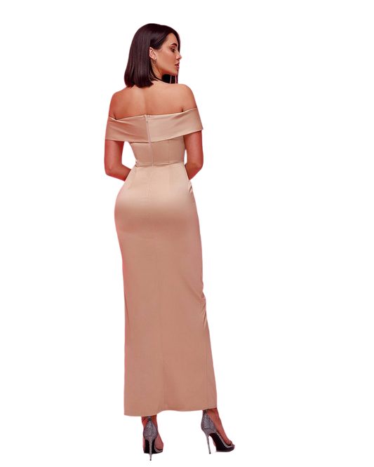 Woman wearing a beige off-shoulder gown on a white background