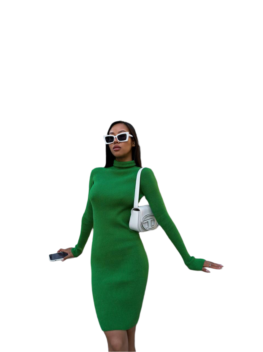 Woman wearing a green dress with a white handbag on a white background