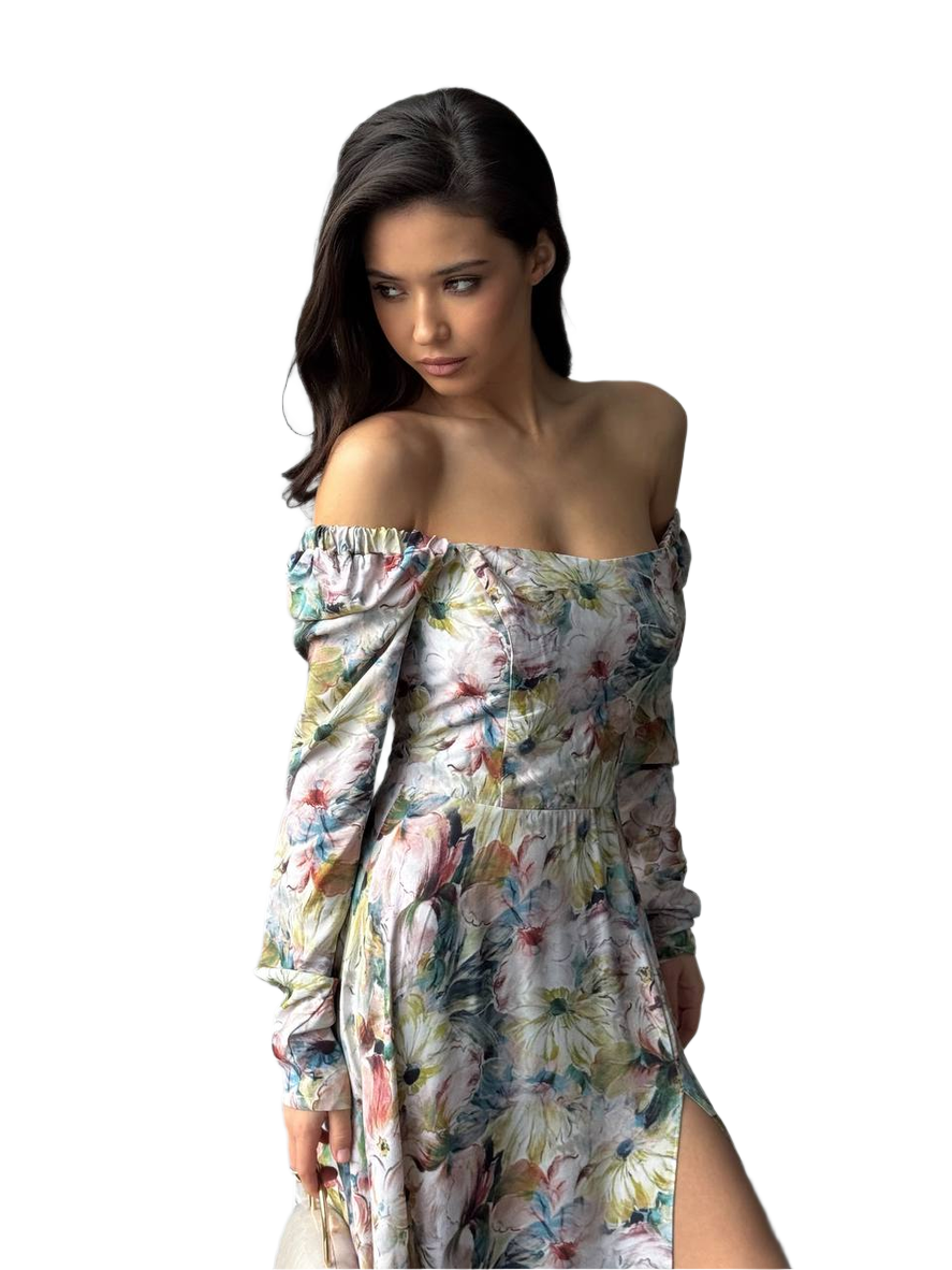 Woman wearing a floral off-shoulder dress on a white background